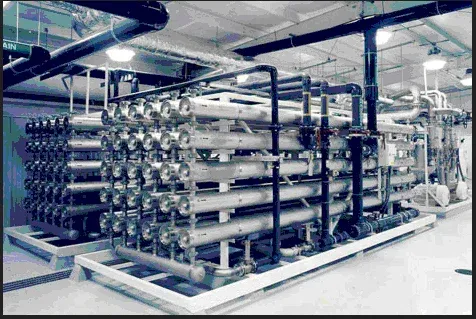 Industrial water treatment plant with reverse osmosis system and filtration units