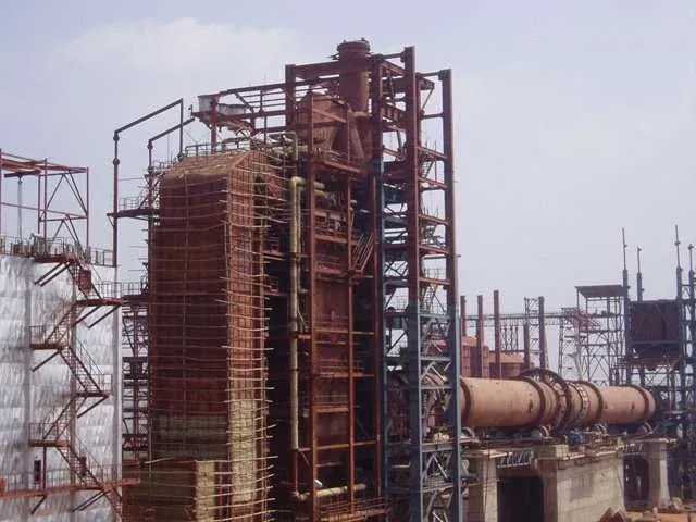 Power plant construction site with boiler unit and rotary kiln system