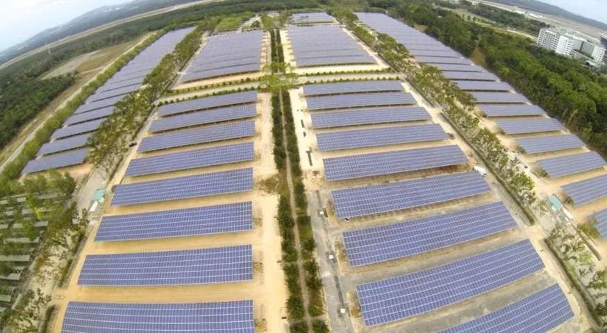 Solar energy plant with grid layout of photovoltaic panels in open landscape