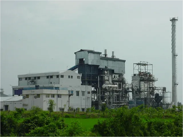 Thermal power plant with smokestack and industrial infrastructure